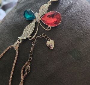 Betsy Johnson Gold Butterfly Necklace with Red and Blue Accents